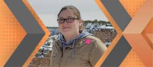 Portrait of Alyssa Redmond framed by an orange and gray geometric background.